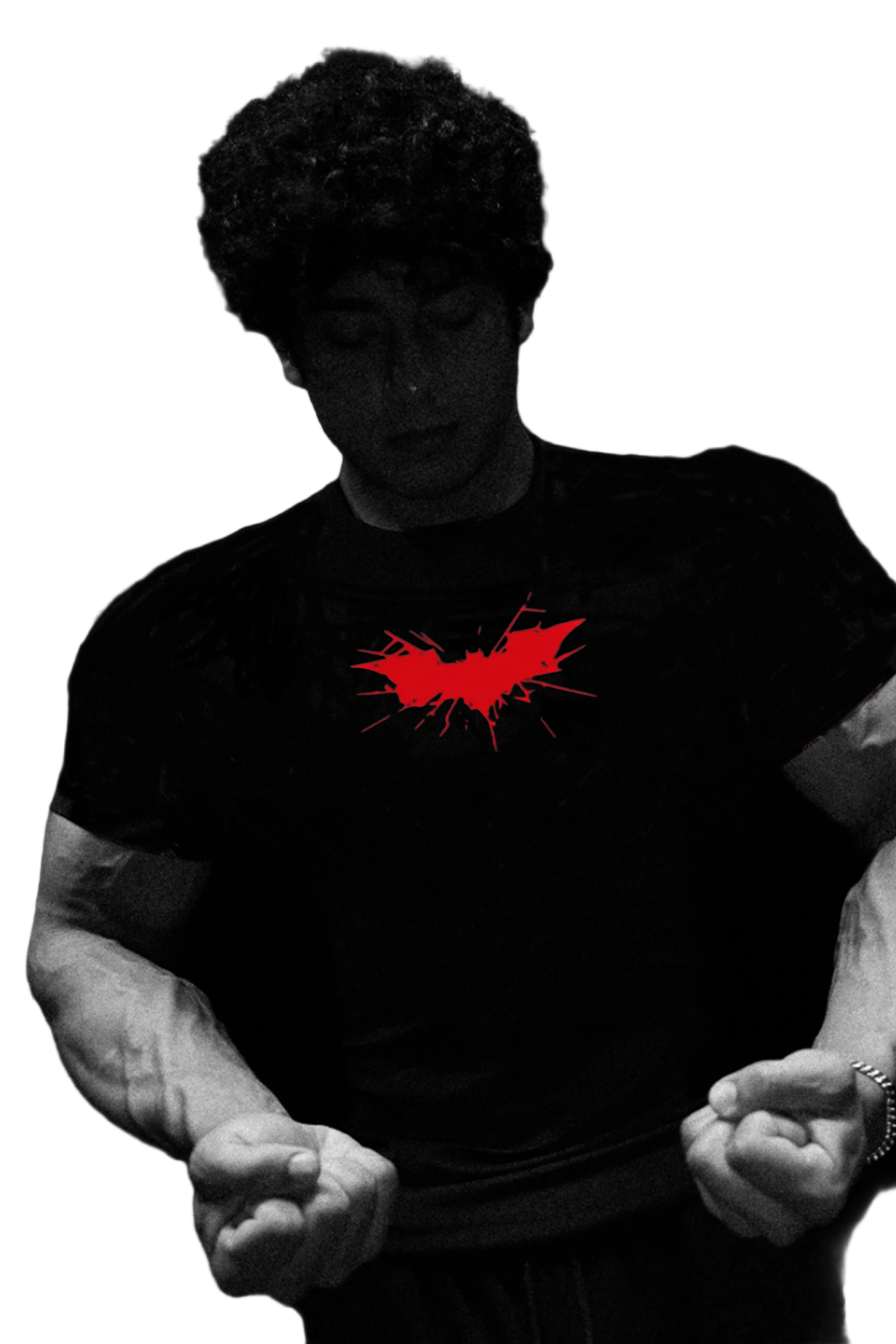 Person wearing a black t-shirt with a red bat symbol on a dark background