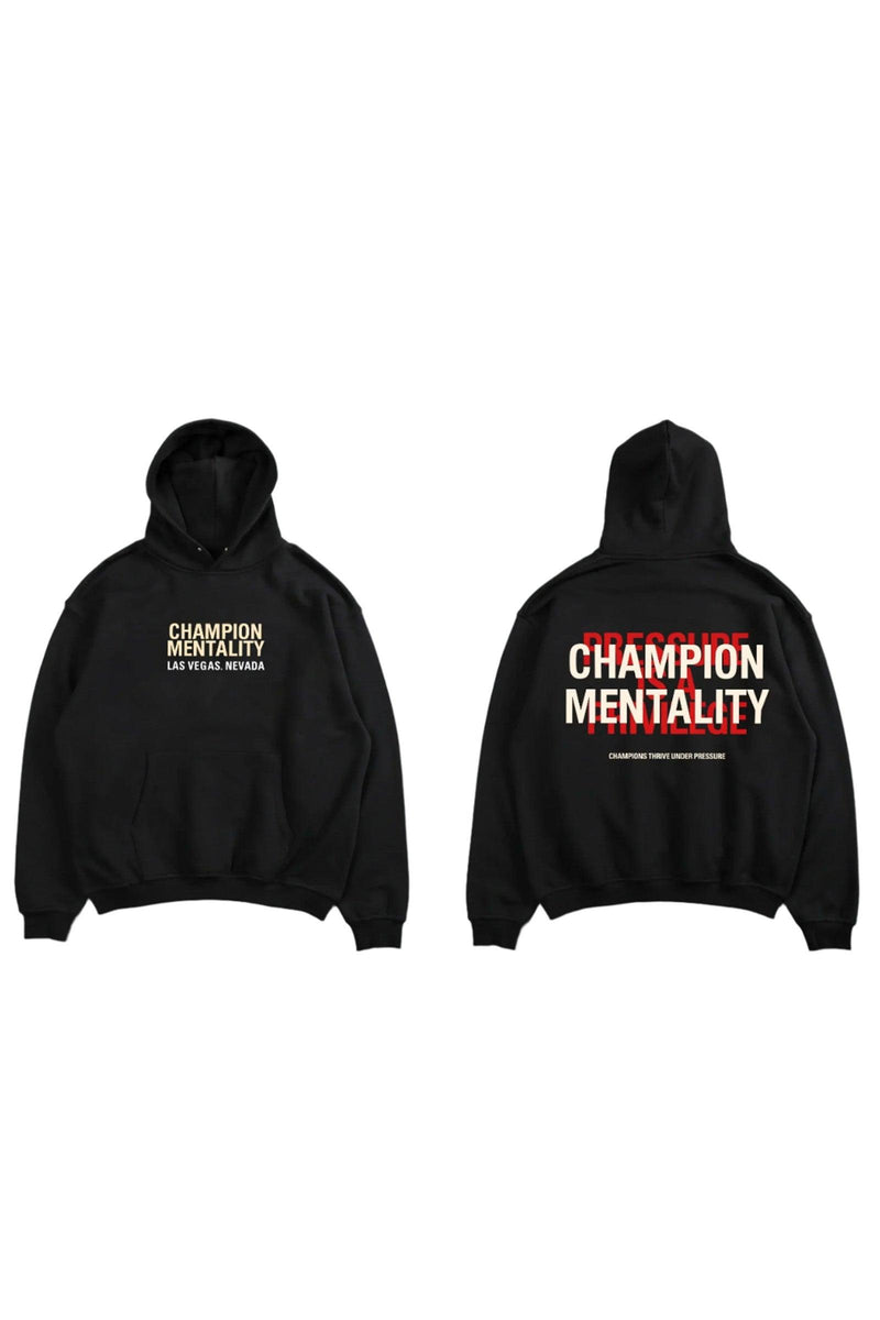 Black hoodie featuring 'Champion Mentality' on the front, designed for comfort and style.