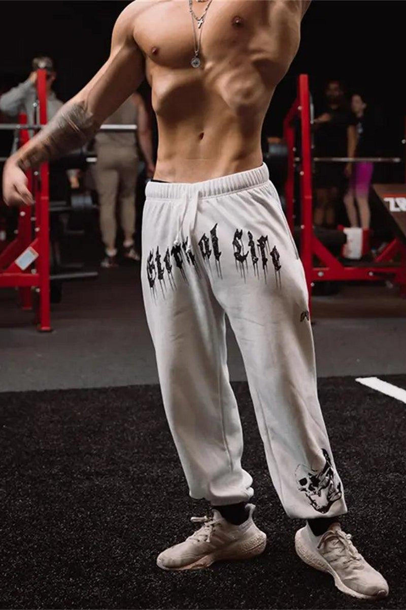 Unisex 'Eternal Life' joggers with elastic waist, side pockets, and tapered fit; 55% cotton, 45% polyester.
