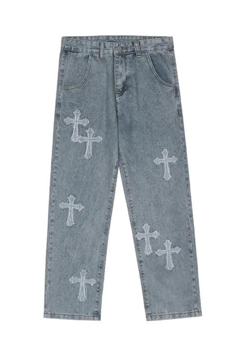 Blue jeans with white cross patterns on a white background