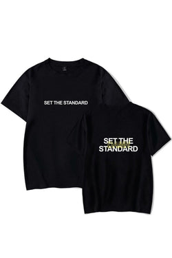 T-shirt featuring 'Set the Standard' text, designed for comfort and style with a relaxed fit, perfect for everyday wear.