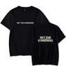 T-shirt featuring 'Set the Standard' text, designed for comfort and style with a relaxed fit, perfect for everyday wear.