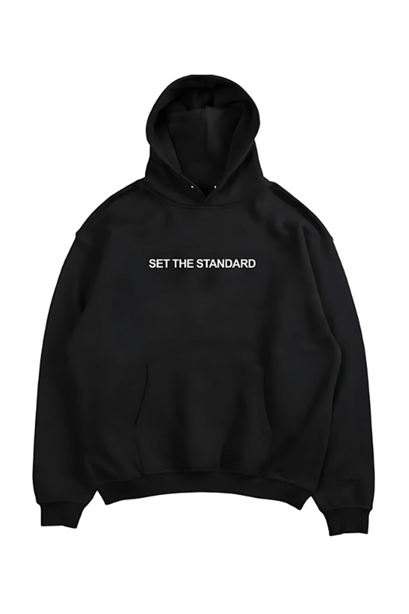 Oversized hoodie featuring 'Set the Standard' text, designed for comfort and style with a relaxed fit and adjustable drawstring hood.