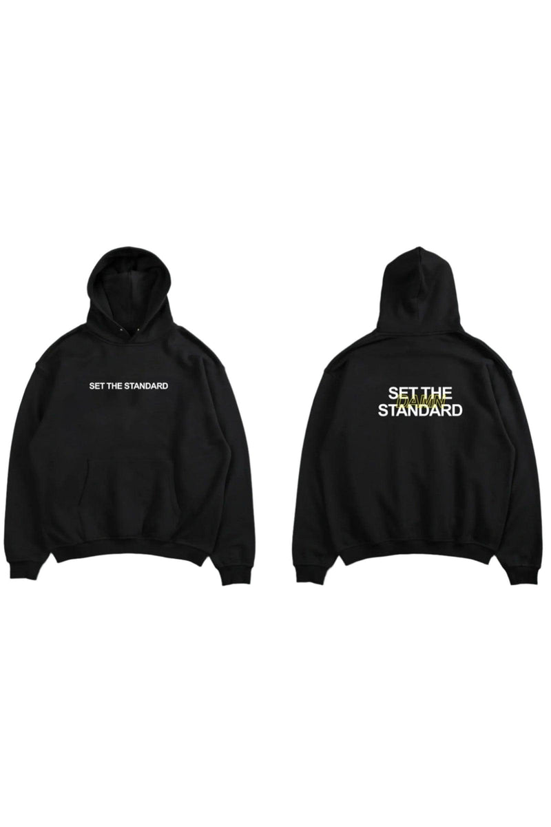 Oversized hoodie featuring 'Set the Standard' text, designed for comfort and style with a relaxed fit and adjustable drawstring hood.