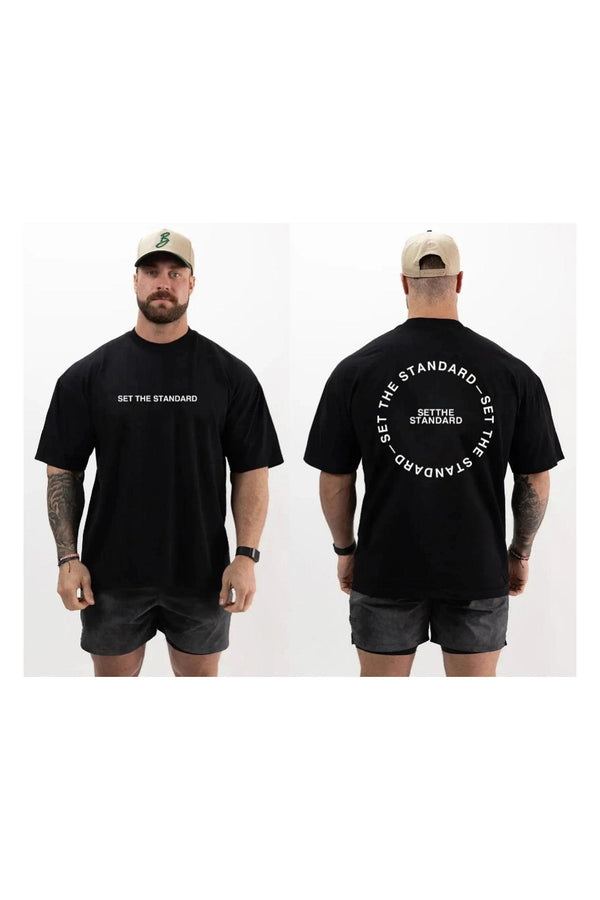 T-shirt featuring 'Set the Standard' text, designed for comfort and style with a relaxed fit, perfect for everyday wear.