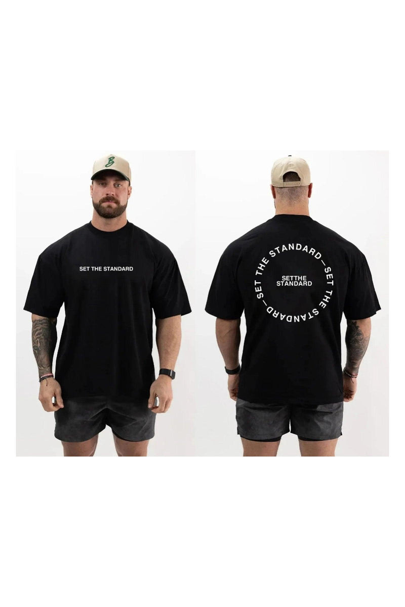 T-shirt featuring 'Set the Standard' text, designed for comfort and style with a relaxed fit, perfect for everyday wear.